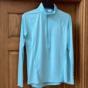Under Armour light blue, lightweight, fitted quarter zip pullover. Women’s MED